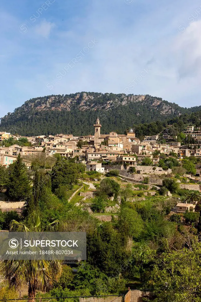 View of the old town of Valldemossa with the parish church of Sant Bartomeu, Serra de Tramuntana, Northwestern Coast, Mallorca, Majorca, Balearic Isla...