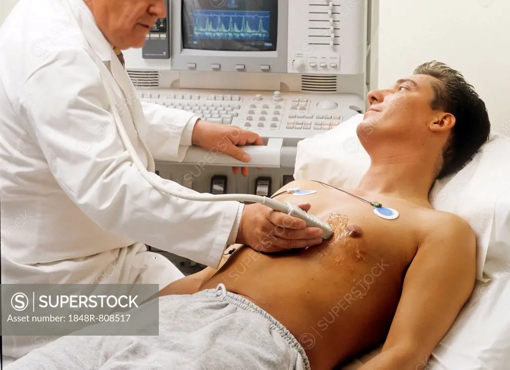 Doctor and patient at a ECG, electrocardiographic examination, Germany