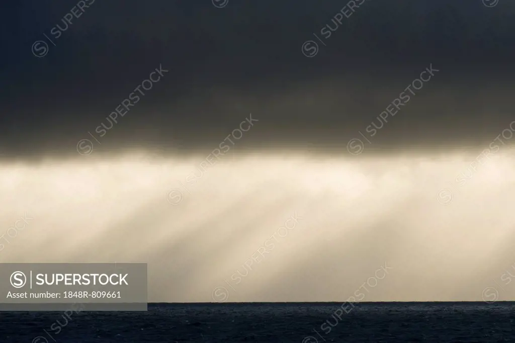 Veil of rain on the horizon, dark clouds above the sea, Arctic Ocean, Spitsbergen Island, Svalbard Archipelago, Svalbard and Jan Mayen, Norway