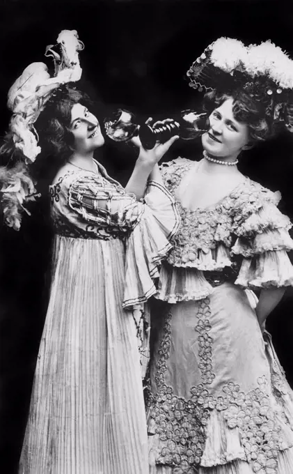 Two women drinking wine, 1910s, Germany