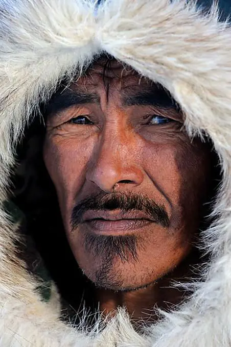Portrait of Inuit hunter with a fur hat, Igloolik, Foxe Basin, Nunavut, Canada, North America