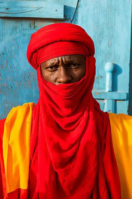 Colourful dressed bodyguard of the sultan of Agadez, Unesco world heritage sight Agadez, Niger, Africa