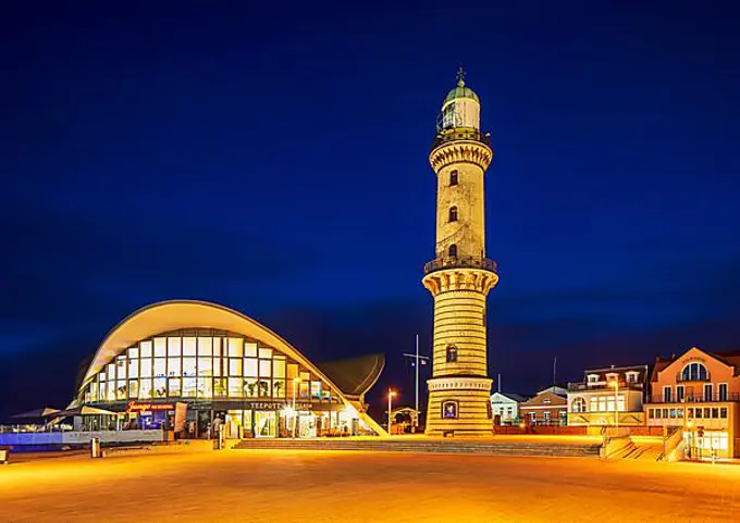 Lighthouse and restaurant Teepott at dusk, Warnemuende, Hanseatic City of Rostock, Mecklenburg-Western Pomerania, Germany, Europe