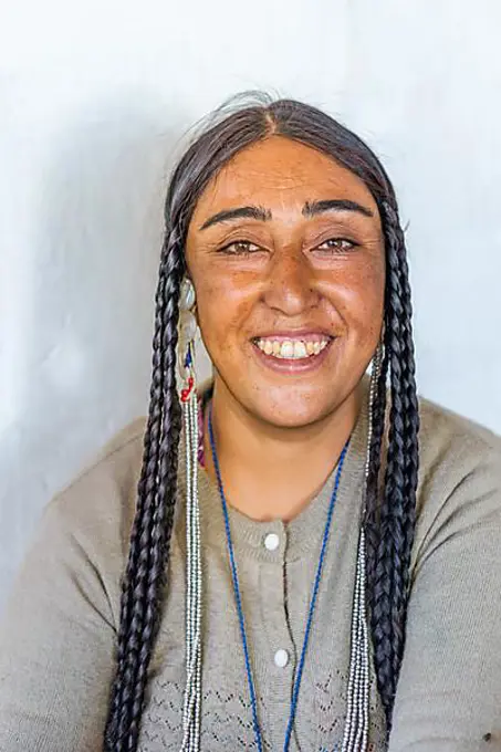 Ladakh, India, August 29, 2018: Portrait of an indigenous smiling young woman in Ladakh, India. Illustrative editorial, Asia