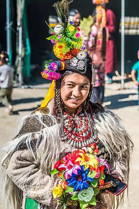 Ladakh, India, August 29, 2018: Portrait of an young indigenous woman in traditional colorful costume in Ladakh, India. Illustrative editorial, Asia