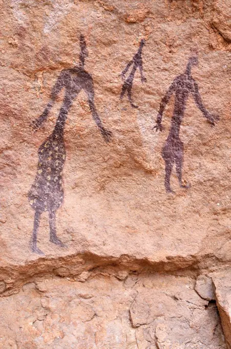 Painted group of people, neolithic rock art at Tin Meskis, Adrar N'Ahnet, Algeria, Sahara, North Africa