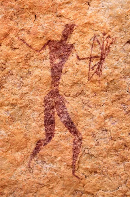Painted warrior, neolithic rock art at Tin Meskis, Adrar N'Ahnet, Algeria, Sahara, North Africa