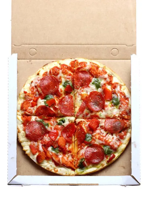 Fast food, pizza in a takeaway pizza box
