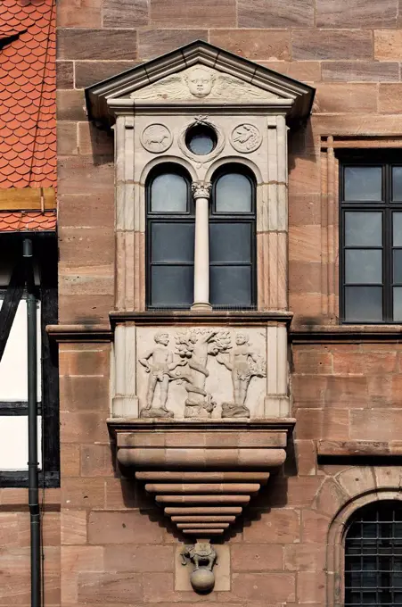 Bay window with a relief of the Fall of Man, on the facade of Tucher Mansion, built 1533-1544
