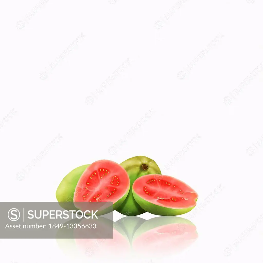Whole and cut guavas
