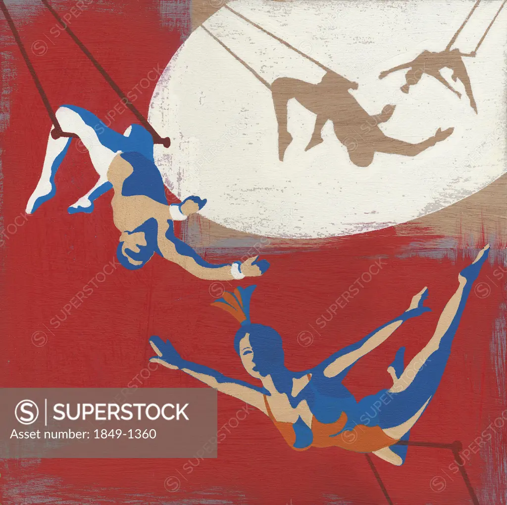 Trapeze artists swinging on trapeze