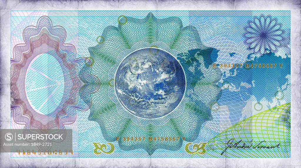 Close up of blue bank note with globe in center