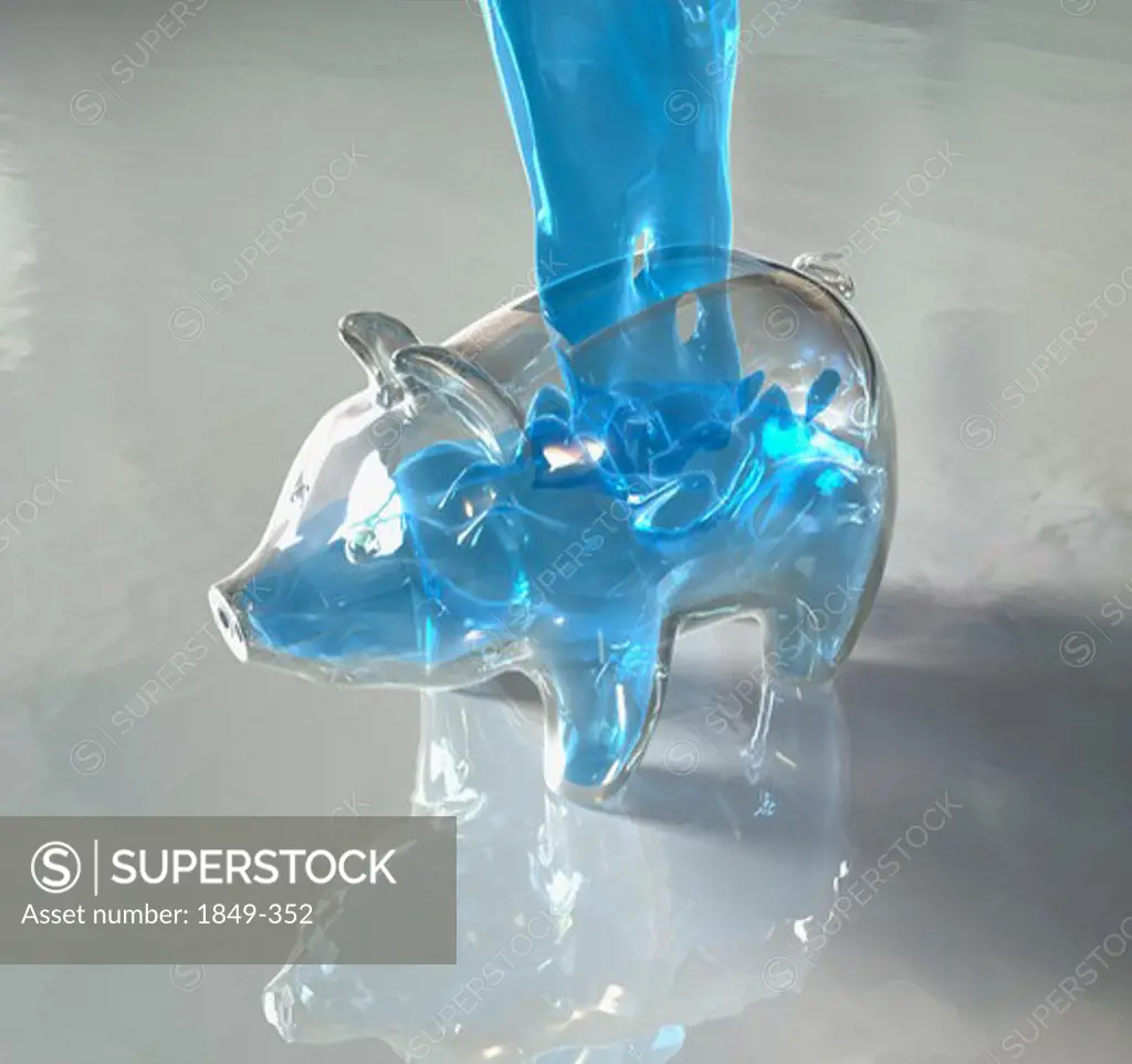 Water pouring into piggy bank