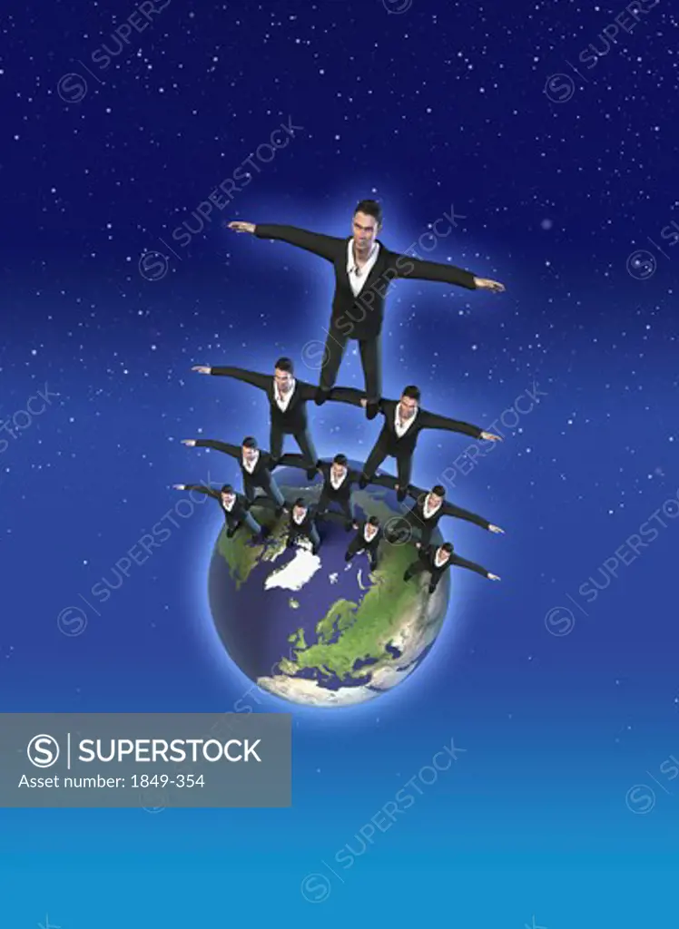 Businessmen balancing on earth