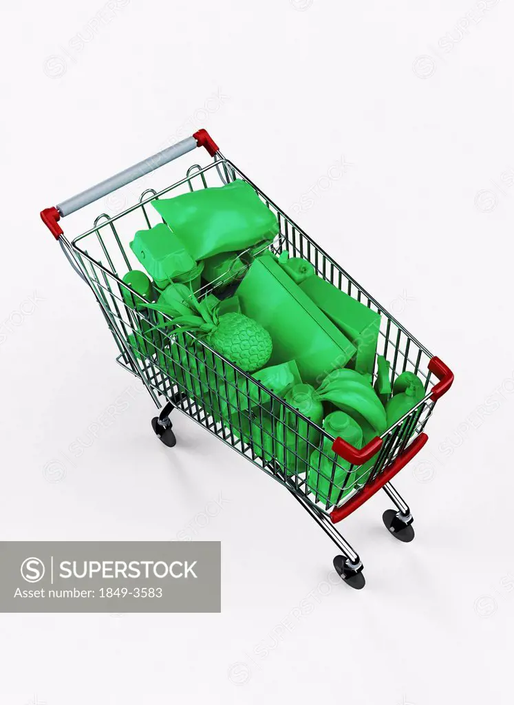Shopping cart full of green groceries