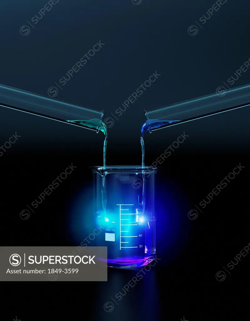 Test tubes pouring glowing liquid into chemistry beaker