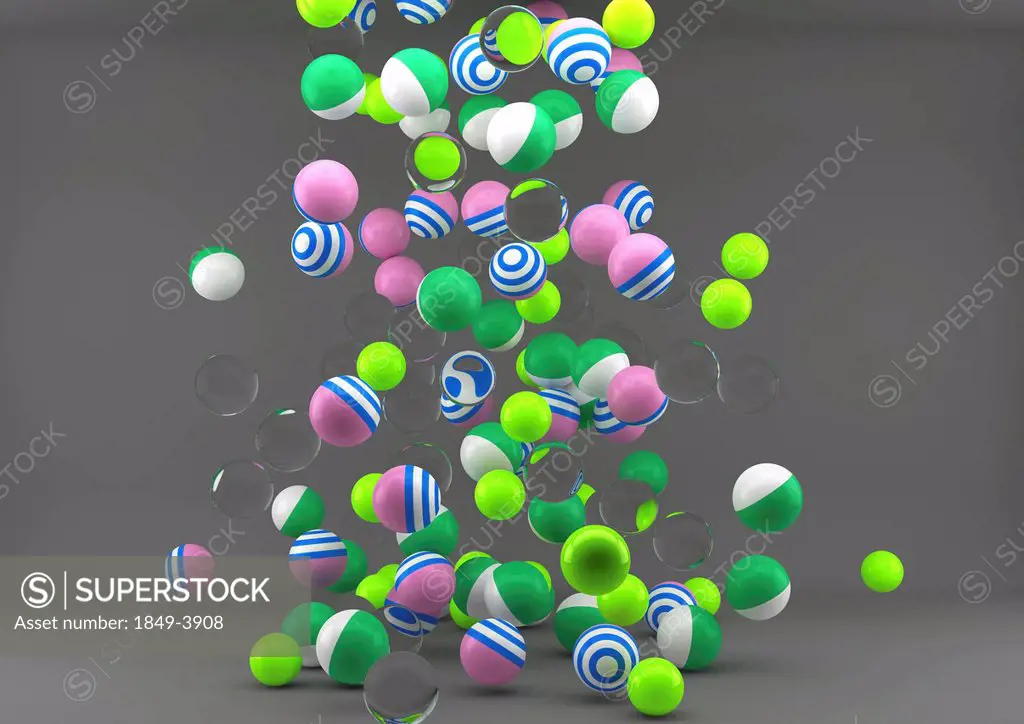 Colorful balls falling onto floor