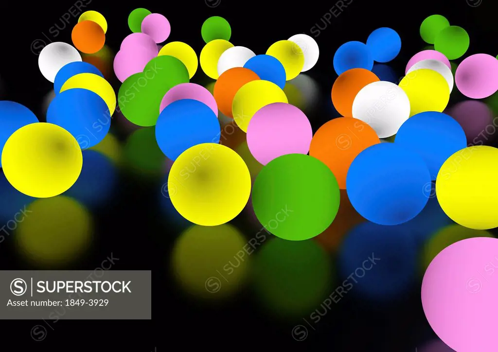 Glowing colorful balls on floor