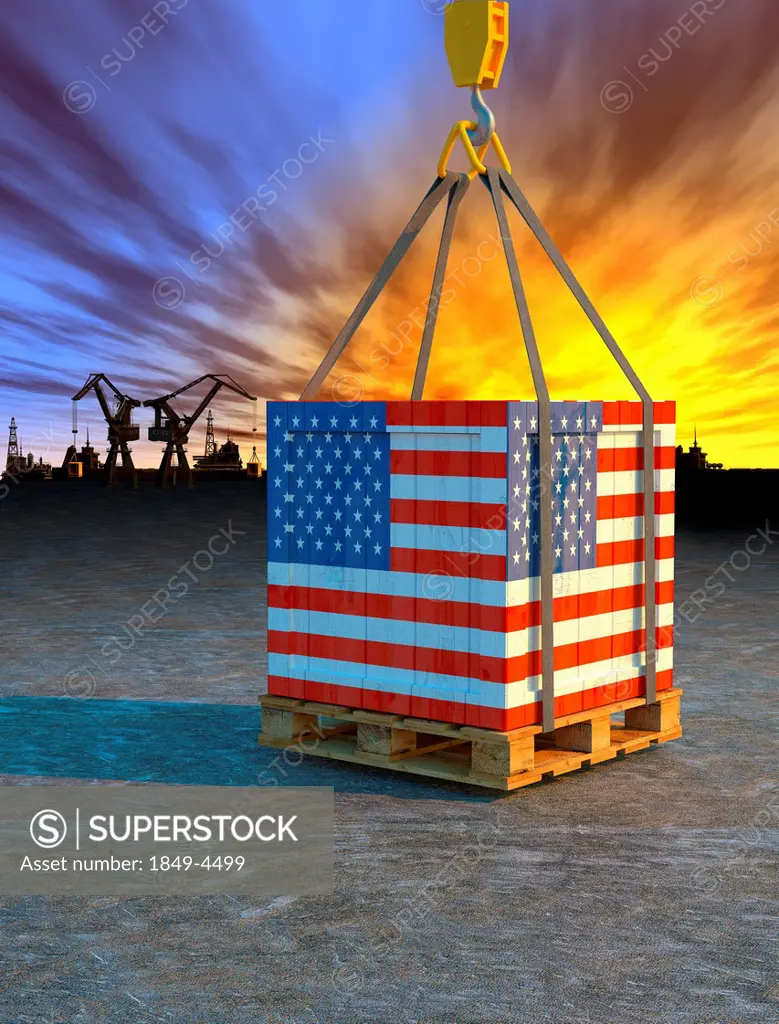 Crane lifting crate painted with American flag