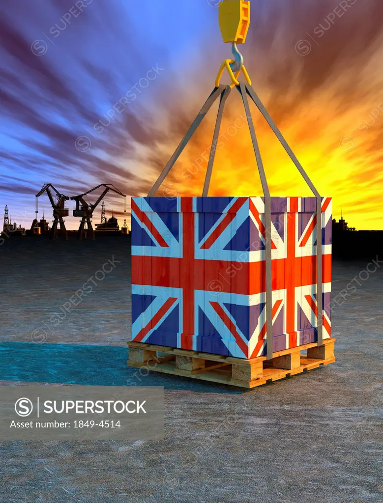 Crane lifting crate painted with British flag