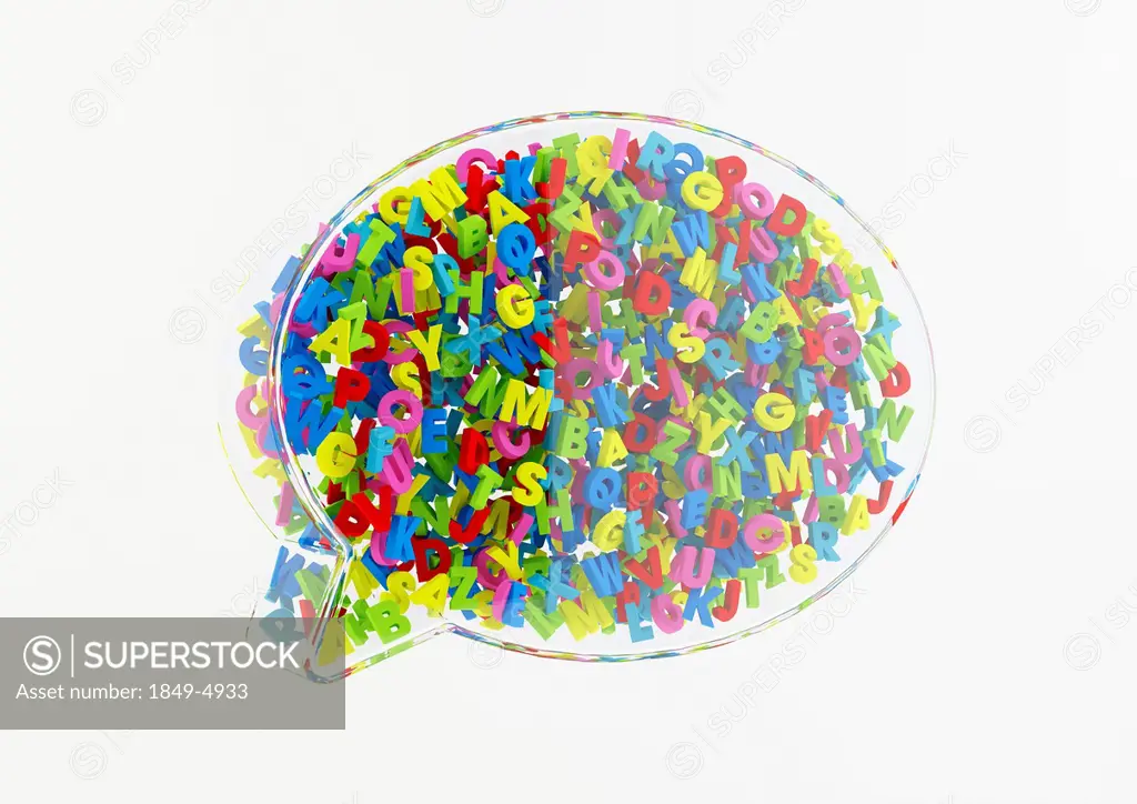 Cluster of multicolored letters in transparent 3d speech bubble on white background