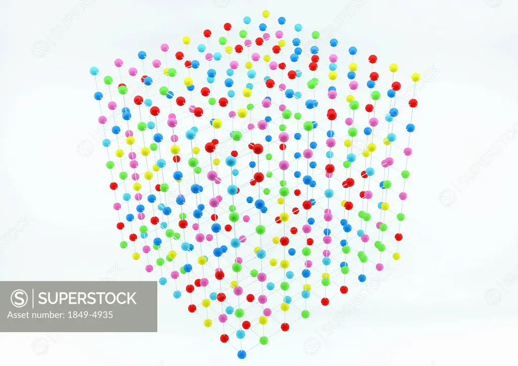 Grid arrangement of multicolored balls in cube shape on white background
