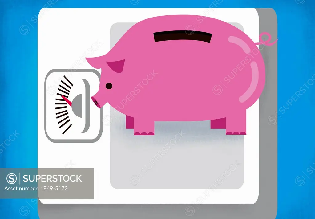 Piggy bank on weight scale