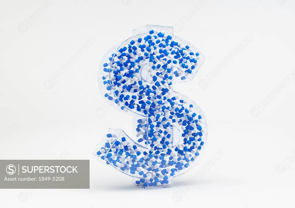 Cluster of blue and white capsules in transparent 3d dollar sign on white background
