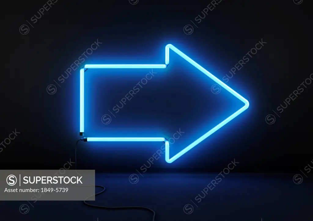 Neon blue arrow on black background