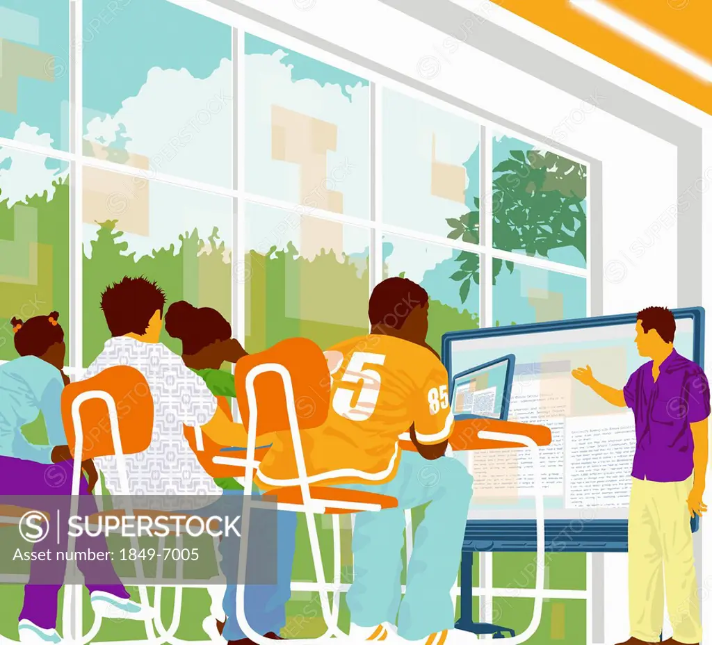 Students watching teacher at screen in modern classroom