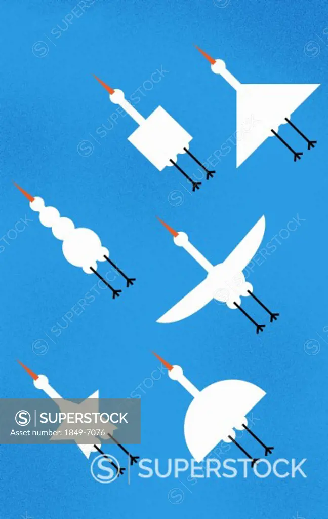 Various shaped birds flying in formation