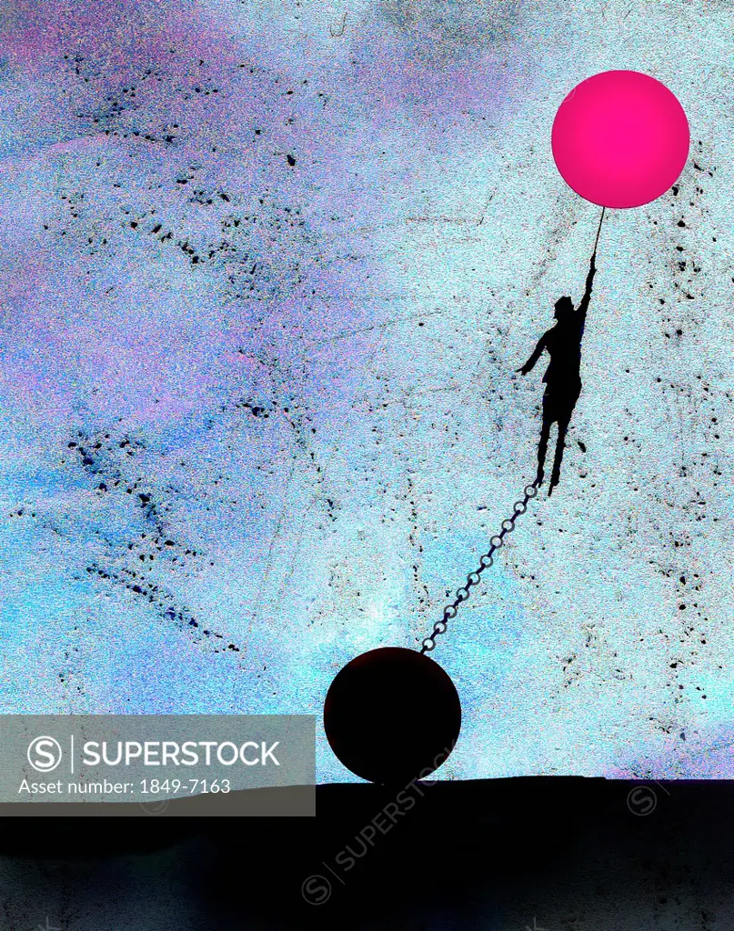 Woman ascending on pink balloon held back by ball and chain