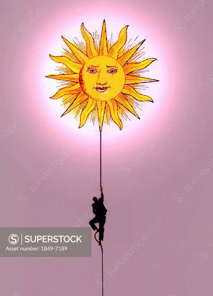 Businessman climbing rope toward sun