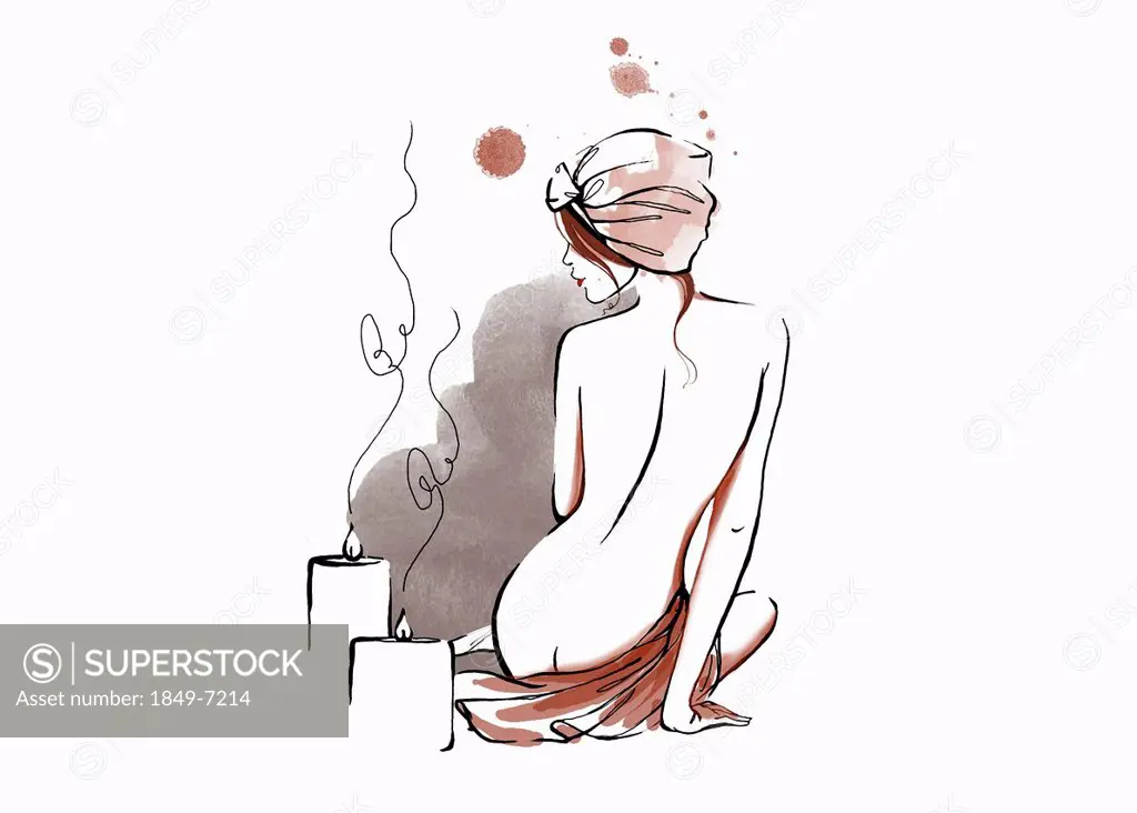 Back of nude woman relaxing with candles and hair wrapped in towel