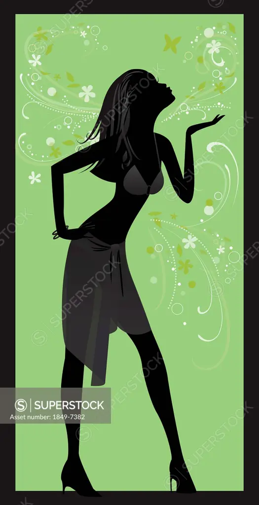Silhouette of woman posing and blowing kiss