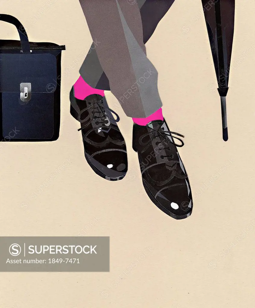Businessman's shiny shoes, pink socks, briefcase and umbrella