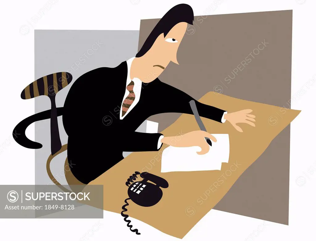 Stressed businessman writing at desk