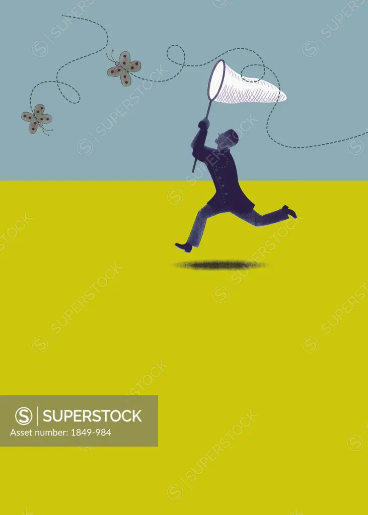 Man chasing butterflies with net