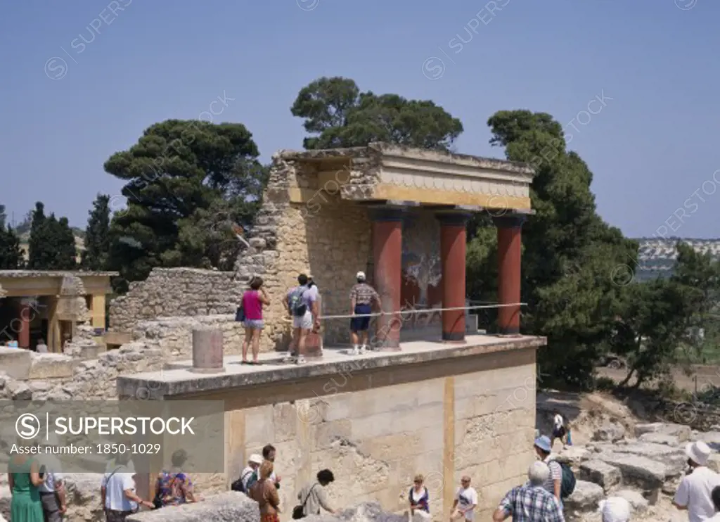 Greece, Crete, Knossos Palace Ruins With Tourists