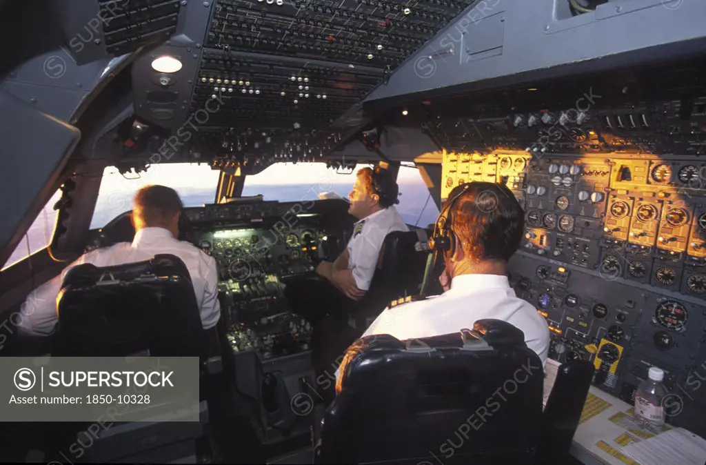 South Africa, Central, South African Airways Boeing 747 300 Cockpit With Pilot And Crew At Daybreak Over Central Africa On A Flight From London To Cape Town