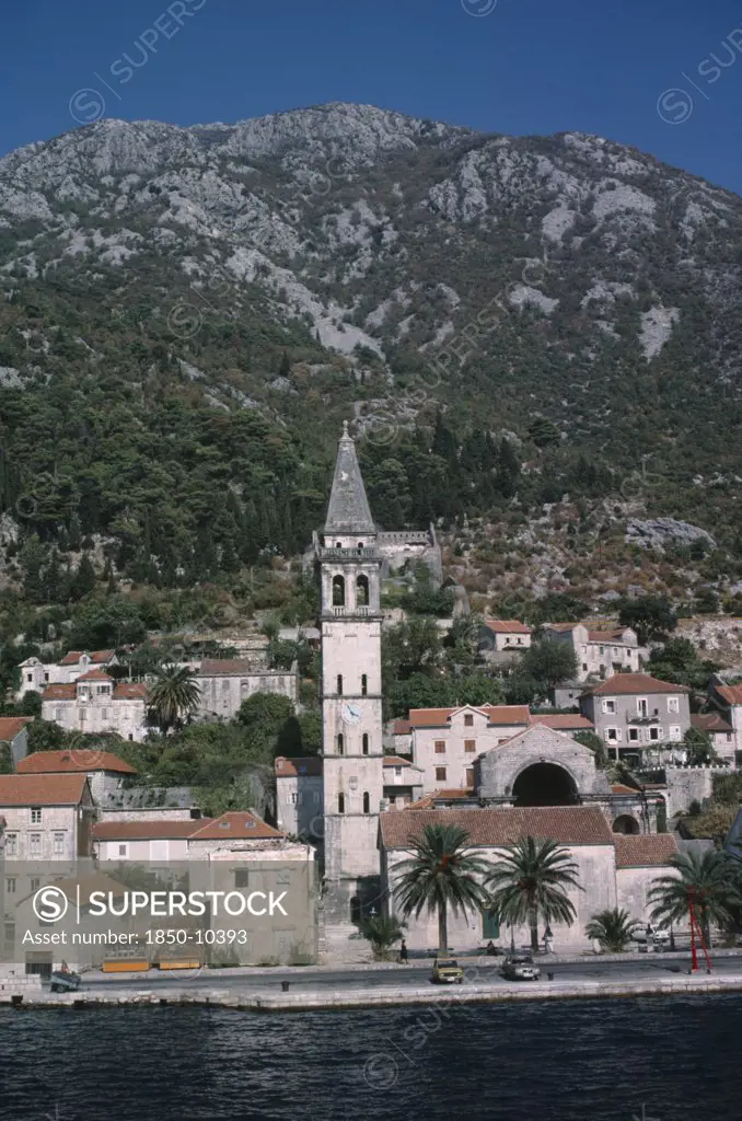 Serbia , And Montenegro, Kotor, Church Belltower Viewed Across Water