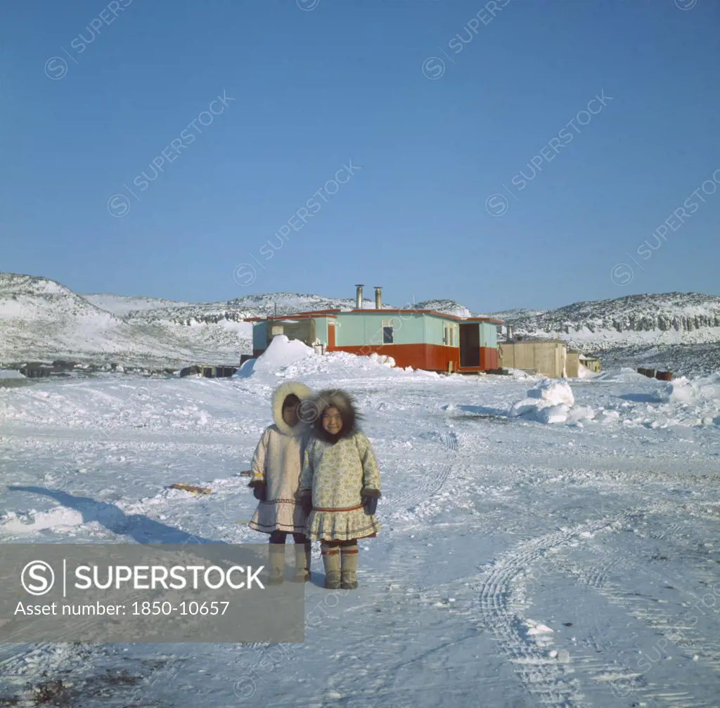 Canada, Nunavut, Baffin Island, Young Innuit Girls Outside Settlement.