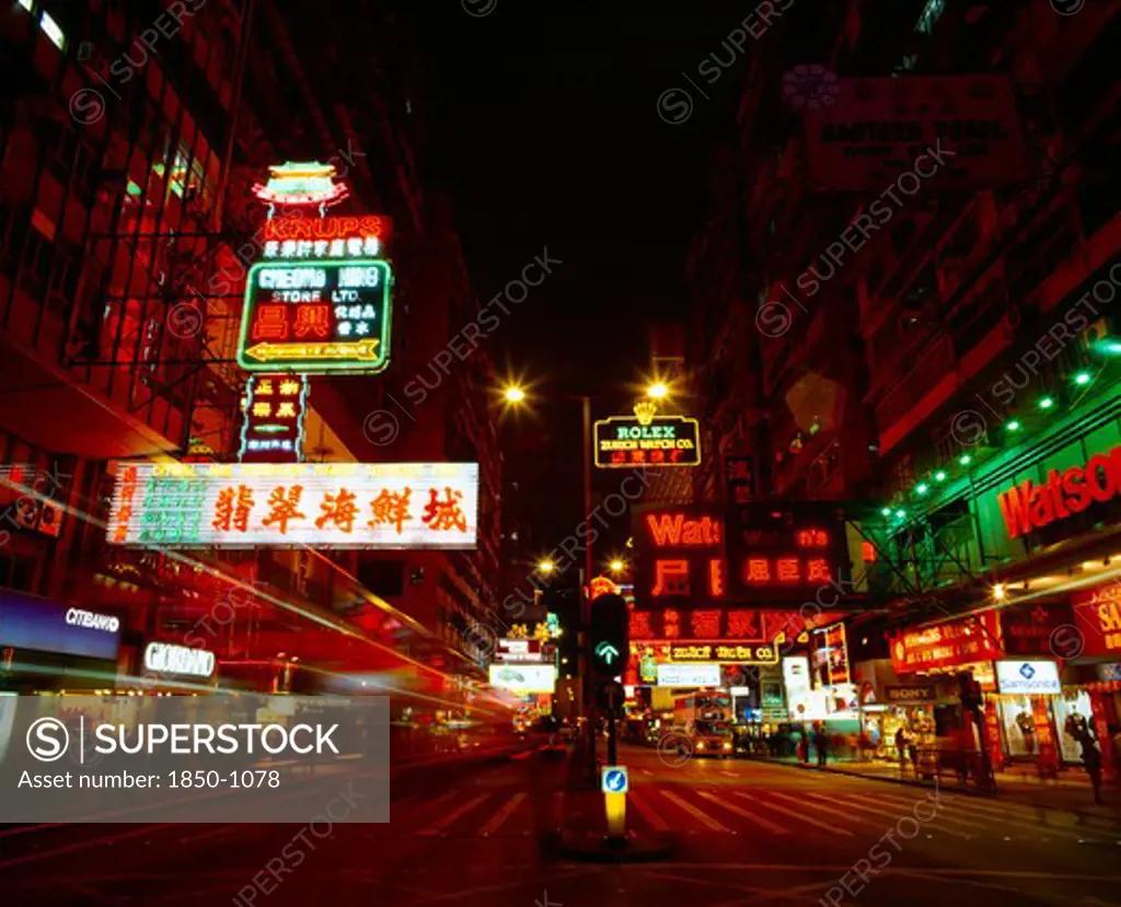 Hong Kong, Kowloon Peninsula, Kowloon, 'Nathan Road At Night With Colourful Neon Lights, Traffic And  Pedestrian Crossing. '