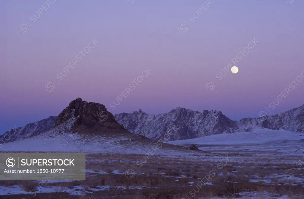 Mongolia, '', Hovd Province, Mountains Lightly Covered In Snow At Sunset With Pink Sky. Rtnd 2 Vkb 15/5/2009