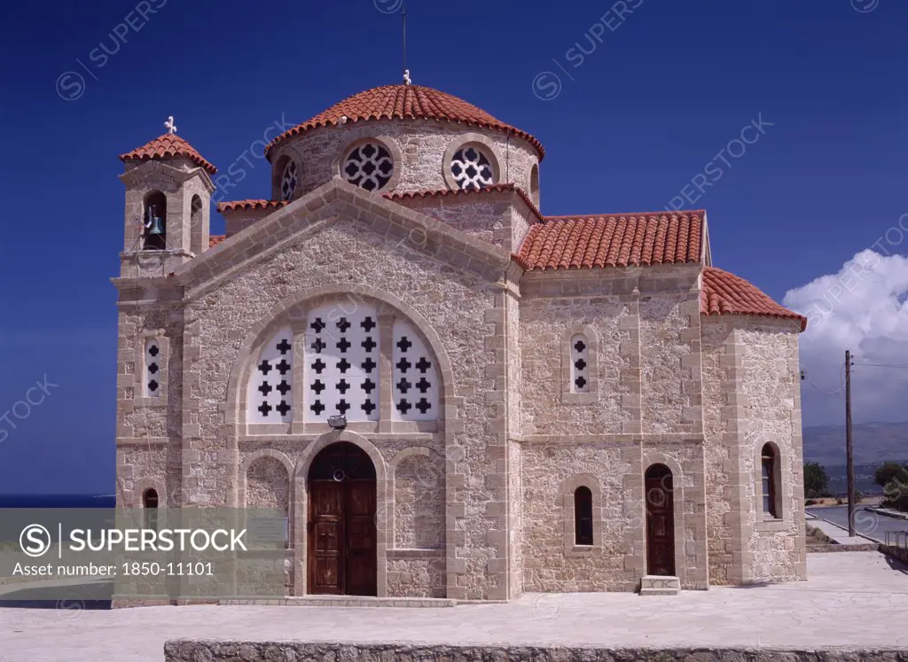 Cyprus, Cape Drepanon, Agios Georgiou, Exterior Of Church With Red Tiled Roof And Bell Tower.