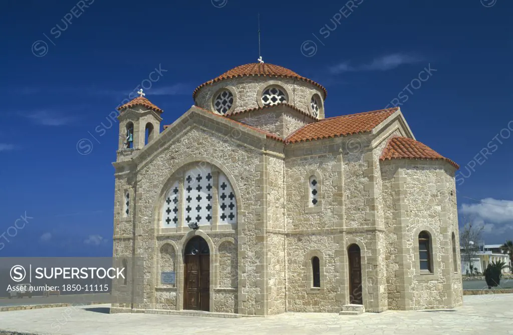 Cyprus, Cape Drepanon, Agios Georgiou Church Exterior With Tiled Roof And Bell Tower.