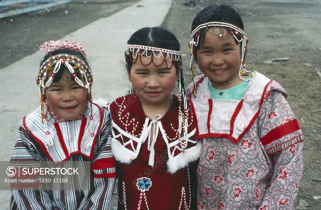 Russia, Siberia, Kamchatka Peninsula, Chukchi Girls Dressed For Spring Festival Achai Vayam.