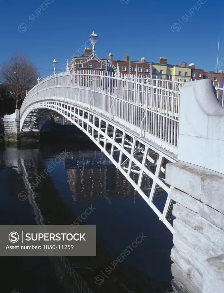 Ireland, Dublin, View Along Halfpenny Bridge Over The River Liffey