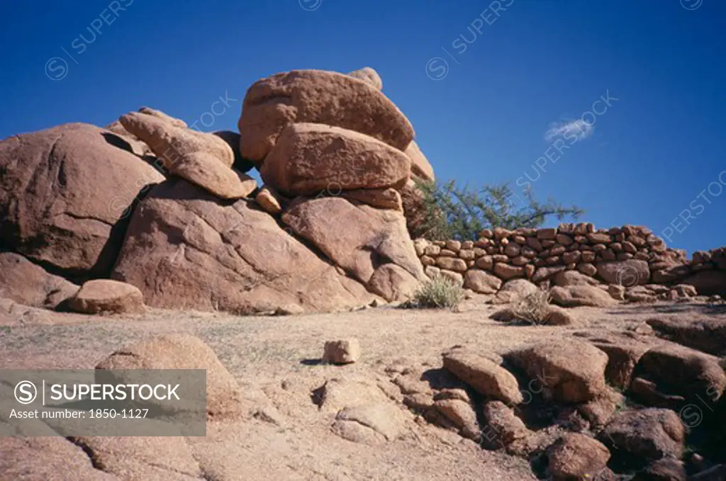 Morocco, Anti Atlas, Atlas Mountains, Tafraout. Rocks And Stone Wall
