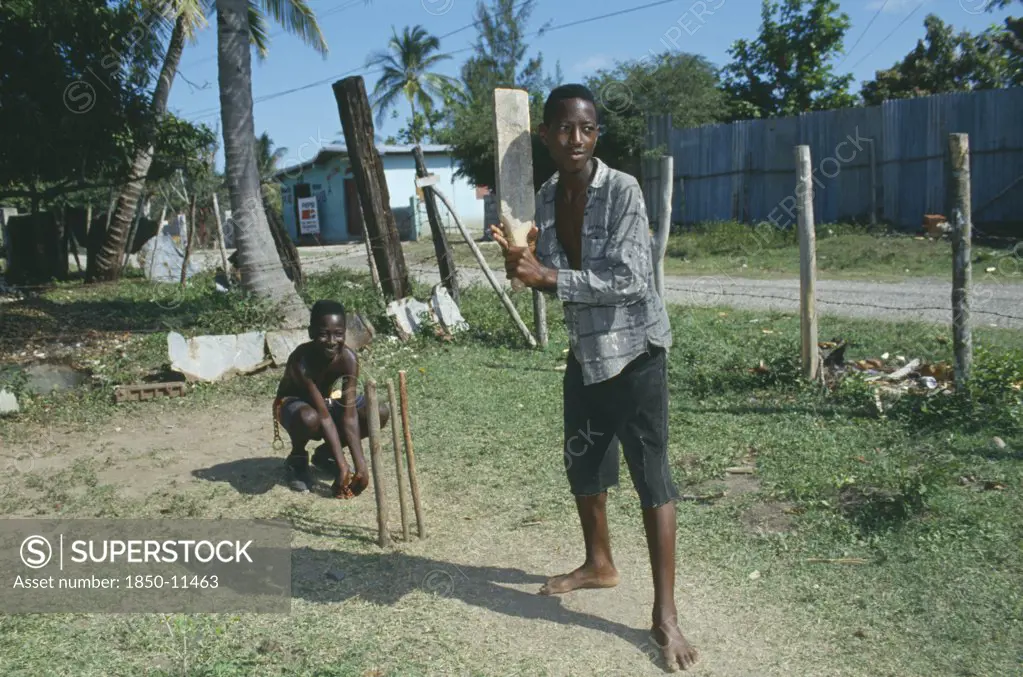 West Indies, Jamaica, Clarendon, Boys Playing Cricket With Home Made Bat And Wickets.